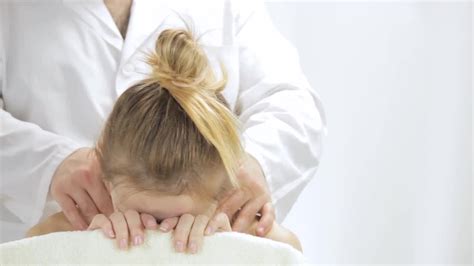 Young Woman Enjoying Relaxing Massage